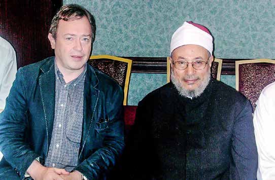 Ian Hamel aux côtés de Youssef al-Qaradhawi, prédicateur et théologien d’origine égyptienne, proche des Frères musulmans. Ce dernier serait « le parrain » de Tariq Ramadan.